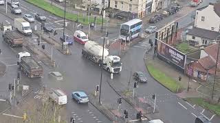 UK ADeliveroo Driver with Green Bag Heading 2Church RdAMotorcycle on Traffic Trucks Trailers Vans [upl. by Watkins]