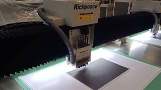 richpeace automatic cnc performation machine for the car seat cover4 [upl. by Enaht533]