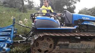 New Holland TK 100 con tiller [upl. by Ahseirej]