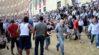 The Siena Palio of August 2011 Mobs and chaos after the end of the race [upl. by Leseil563]