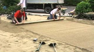 Screeding a paving laying course [upl. by Bertero786]