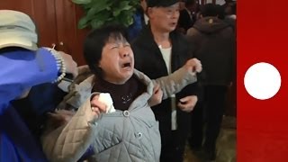 Malaysian plane shock Families of MH370 passengers react to news about crashed jet [upl. by Steve]