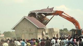 NO COMMENT KINSHASA LA DÉMOLITION DES MAISONS CONSTRUITES SUR SOCOPAO POIDS LOURD [upl. by Htenaj]