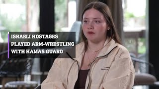 Female Israeli hostages played armwrestling with Hamas guard [upl. by Aserret780]