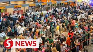 Global IT outage causing long wait for checkin luggage drop at KLIA2 [upl. by Lilli840]