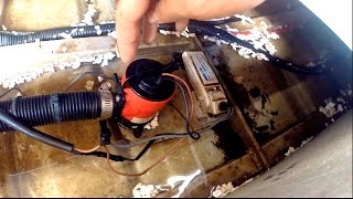 Positioning a bilge pump and float switch in a boat [upl. by Akaenahs839]