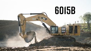 Caterpillar 6015B Excavator Loading 777 Trucks [upl. by Yuht]