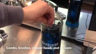 How to sanitise barber equipment using Barbicide and clippe [upl. by Arramat]