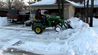 John Deere X728 wCompact Tractor loader moving snow [upl. by Wilkison]