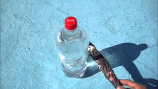 Making a fire using a Coke bottle [upl. by Erlond]