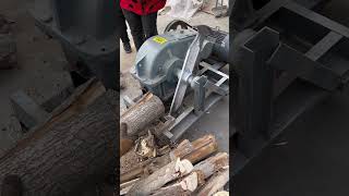 Using a wood splitter saves time and effort shorts woodsplitter cuttingmachine woodwork [upl. by Lokin]