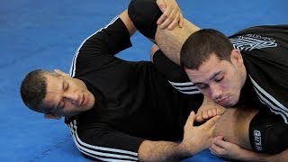 How to Do a Crucifix Omoplata  MMA Submissions [upl. by Jordison]