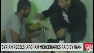 Afghan Hazaras in Syria Iranians pay us to fight for Assad [upl. by Latnahs]