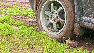 car tire slipping while stuck in a dirt closeup [upl. by Teryl]