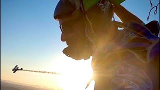 Skydiver flies formation with Biplane Skydiving out of Navy N3N Featuring Cessna 175 The Beast [upl. by Etienne344]