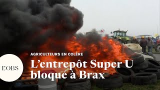 Des agriculteurs bloquent un entrepôt de Super U à Brax et ciblent la grande distribution [upl. by Kotta]