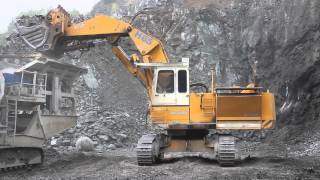 Demag H65 front shovel loading mobile crusher [upl. by Tarr555]