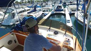 Docking Back Into a Slip with a Single Outboard  BoatUS [upl. by Hoopes]