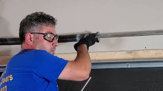 How much tension to put on your garage door spring youtube tutorial new funny diy fyp follow [upl. by Notyalk]