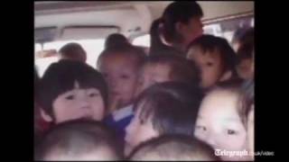 China minibus stopped by shocked police for carrying 66 school children instead of eight [upl. by Acino]