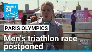 Mens Olympic triathlon race postponed over Seine pollution levels • FRANCE 24 English [upl. by Nivrag]