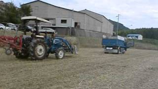 BALING HAY FORD 5610ampIHI STAR TCR2220AT [upl. by Rochkind]