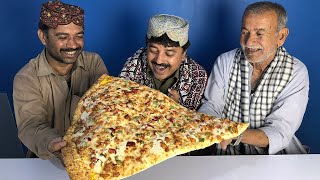 Tribal People Try Big Pizza For The First Time  Villagers Try Big Pizza [upl. by Ikcaj]