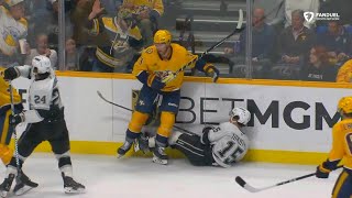 Jeremy Lauzon lays a crushing hit on Alex Turcotte along the boards [upl. by Fleurette]