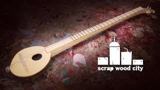 Making a 2 string musical instrument out of coconut and wood [upl. by Collier944]