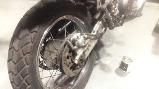 XT600e Rear Brake Caliper Rebuild  pistons and pads [upl. by Esylle]