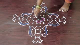 Easy and Simple Gandaberunda design Rangoli  Two headed Bird Rangoli Design with 124 Dots [upl. by Fellows395]