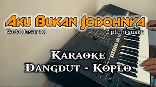 AKU BUKAN JODOHNYA Tri suaka  Karaoke dangdut koplo version [upl. by Ardnnek]