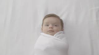 how to swaddle a baby  safe  easy swaddling technique  aden  anais™ [upl. by Delahk]