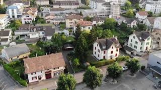 Drone Over Colombier Aerial Views of Swiss Village and Lake Neuchâtel [upl. by Emmey]