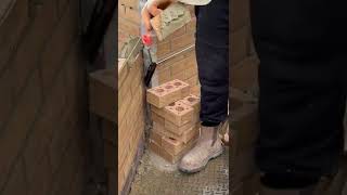 bricklayer bricklaying buttering short viralvideo garden wall [upl. by Eitirahc]