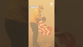 Firefighter saves American flag from California wildfire [upl. by Ahcropal]