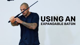 How To Use An Expandable Baton For Police And Law Enforcement [upl. by Navannod]