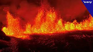 Liquid hot magma Lava jets light up the night sky and consume a road in Grindavik [upl. by Vez]