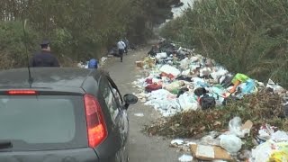 Giugliano NA  Polizia sequestra discarica abusiva in Via Ripuaria 261114 [upl. by Cumine663]