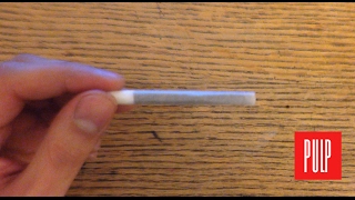 How to roll a cigarette [upl. by Nosyerg]