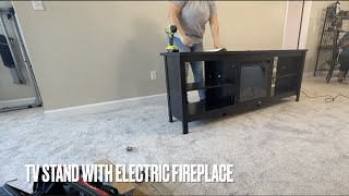 HOW TO ASSEMBLE  WALMART TV STAND WITH ELECTRIC FIREPLACE [upl. by Annaj971]