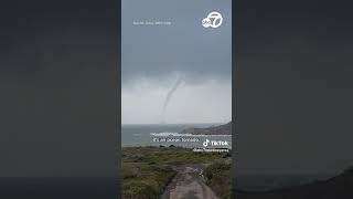 Its an ocean tornado Hikers have hilarious reaction to waterspout [upl. by Lleroj]