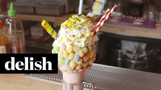 How To Make Black Tap Sour Power Milkshake  Delish [upl. by Payson]