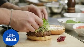 Impossible Foods unveils bleeding realistic vegan burger [upl. by Yrellam79]