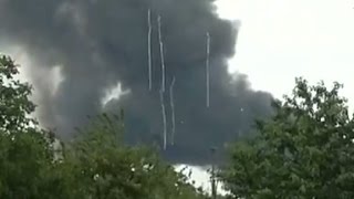 Malaysia Airlines debris seen falling from the sky in Ukraine [upl. by Glassman274]