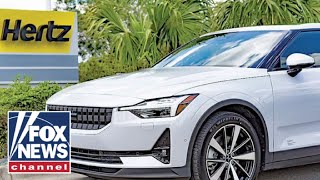 HITTING WHERE IT ‘HERTZ’ Major rental car company to shrink EV fleet [upl. by Josepha622]