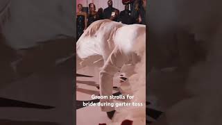 Groom Strolls for bride during garter toss wedding love weddingreception [upl. by Ayotan]