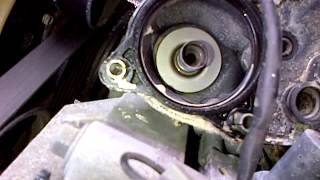 Changing upper and lower thermostat housing 2005 part 2 [upl. by Nosduj]