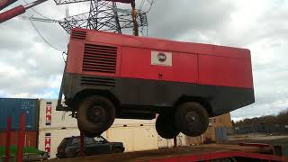 FASSI F210 TRUCK CRANE lifting 55 ton compressor [upl. by Luana13]