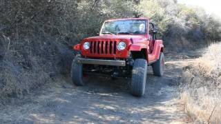 Jeep JK quotShort Cutquot concept vehicle tackling moguls [upl. by Yaeger]